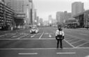 Policeman in between the demonstrators